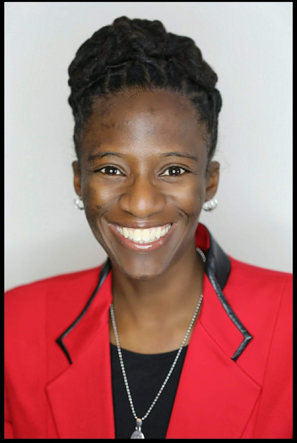 Professional portrait of Shekinah Apedo, Founder and Executive Director of WVBF
