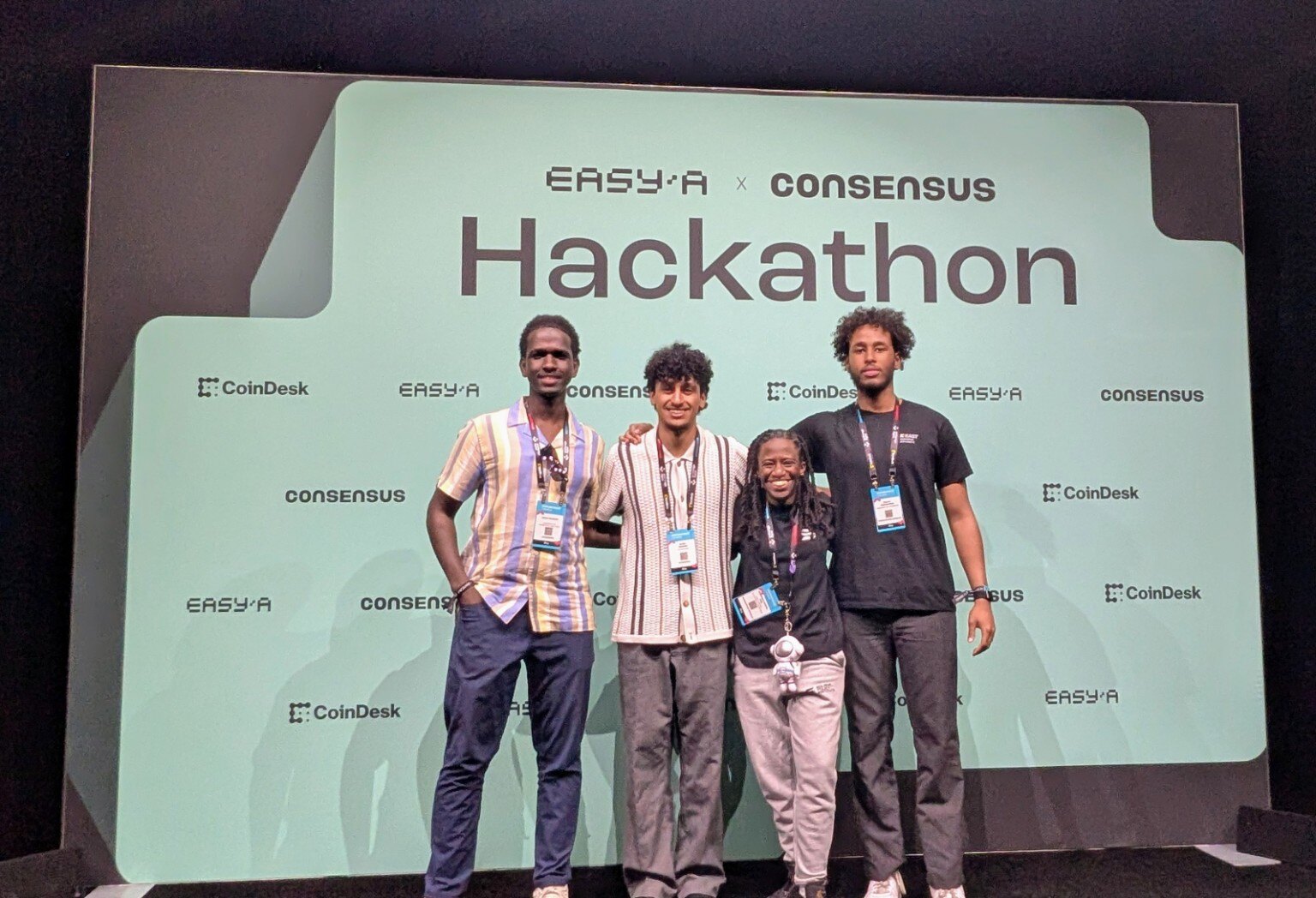 Shekinah Apedo with the BBSN TRAC3R team, including students from the University of Colorado Boulder and the University of Minnesota, at Consensus 2026 in Miami, Florida