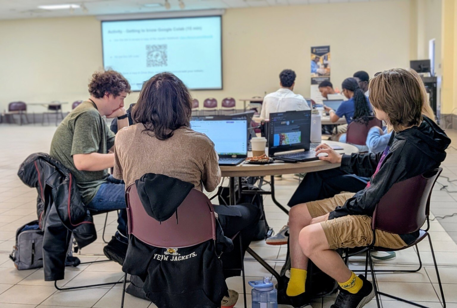Students building in teams at the WVSU Cybersecurity Innovation Center hackathon in April 2026